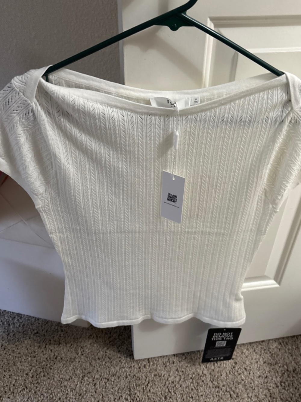 Astr the label, white short sleeve blouse, new with the tag size medium